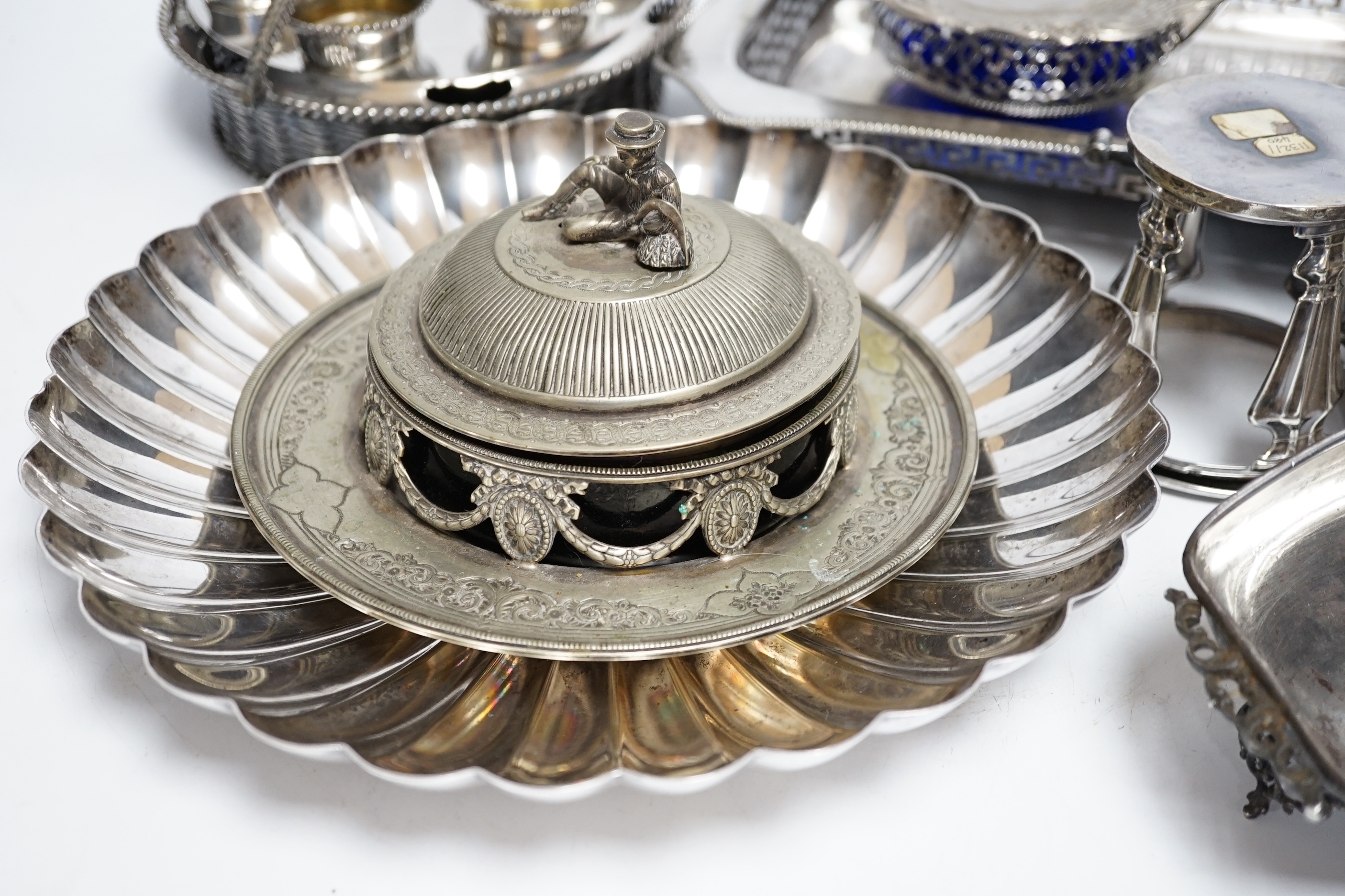 A plated egg cruet and sundry plate